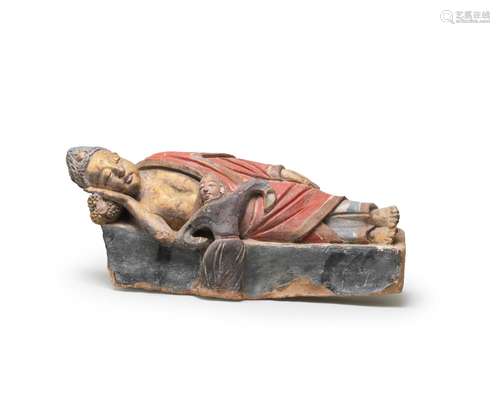 A RARE LARGE PAINTED STUCCO RECLINING FIGURE OF BUDDHA  West...