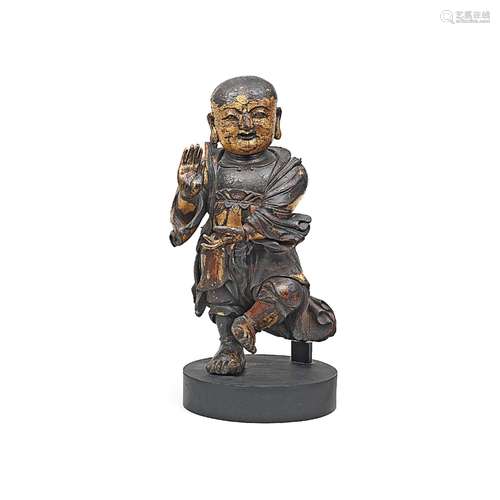 A RARE LARGE GILT-LACQUERED WOOD FIGURE OF SUDHANA Ming Dyna...