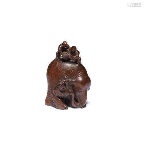 A RARE CARVED BOXWOOD 'ELEPHANT' GROUP  Late Qing Dynasty (2...