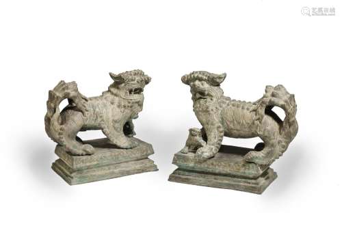 A LARGE PAIR OF METAL-ALLOY BUDDHIST LIONS Qing Dynasty (2)
