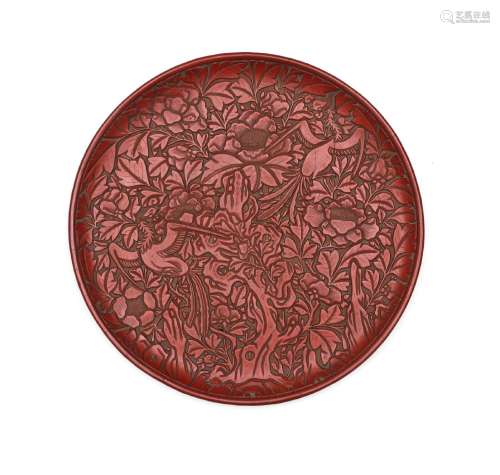 AN EXCEPTIONALLY RARE LARGE CINNABAR LACQUER 'PHOENIX AND PE...