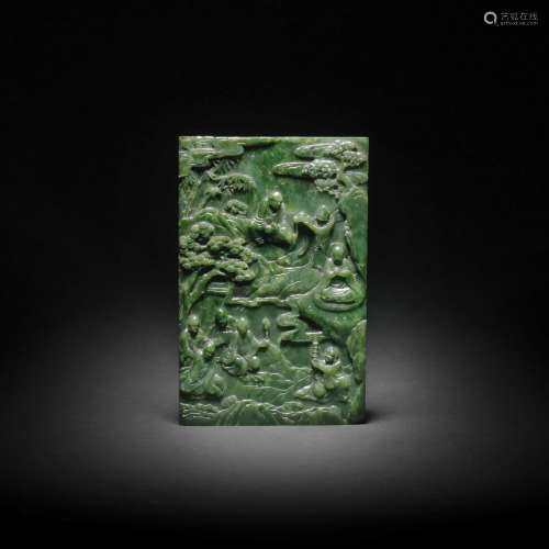 A RARE AND FINE SPINACH-GREEN JADE CARVED 'EIGHT LUOHANS' TA...
