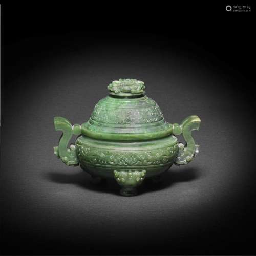 A RARE ARCHAISTIC SPINACH-GREEN JADE TRIPOD INCENSE BURNER A...