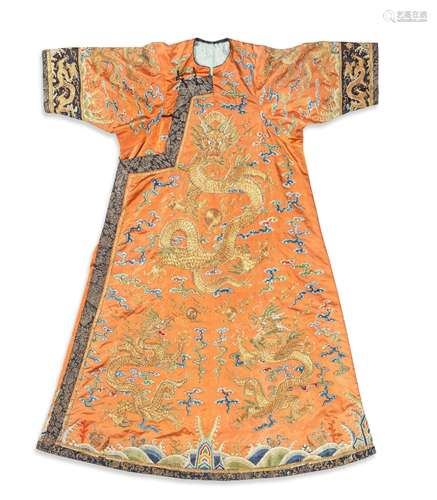 A RARE IMPERIAL APRICOT-GROUND EMBROIDERED SILK WOMAN'S COUR...