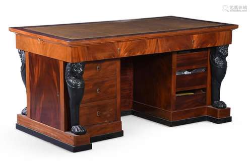 AN EMPIRE STYLE MAHOGANY AND EBONISED DESK