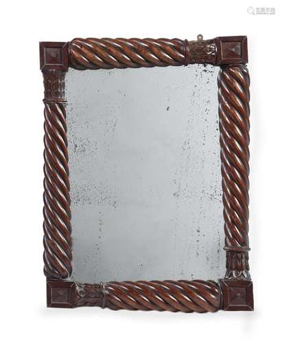 A MAHOGANY WALL MIRROR