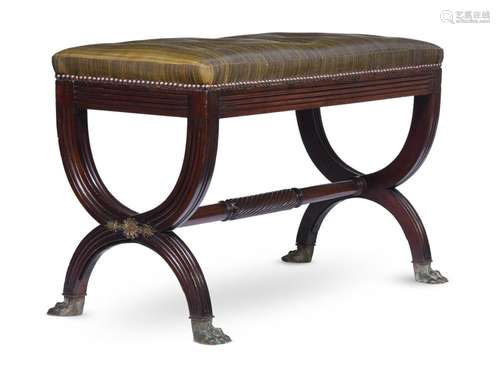 A MAHOGANY STOOL IN REGENCY STYLE