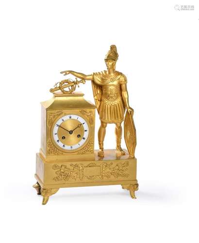 A FRENCH EMPIRE GILT METAL MANTEL CLOCK