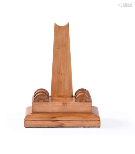 A CARVED WOOD PLATE STAND