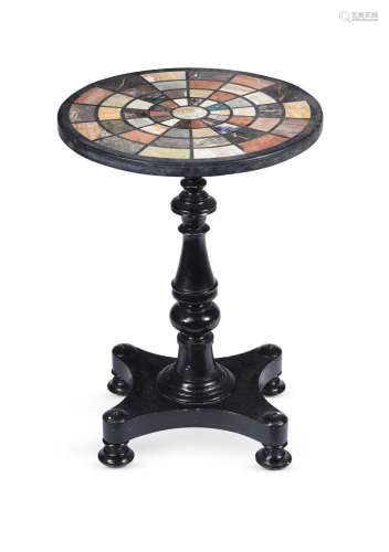 AN EBONISED AND SPECIMEN MARBLE TOPPED LOW OCCASIONAL TABLE