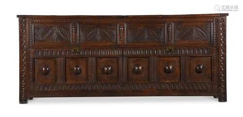 A LARGE CARVED OAK MULE CHEST OR SIDE CABINET IN 17TH CENTUR...