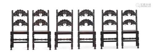 A SET OF SIX CARVED OAK CHAIRS IN 17TH CENTURY STYLE
