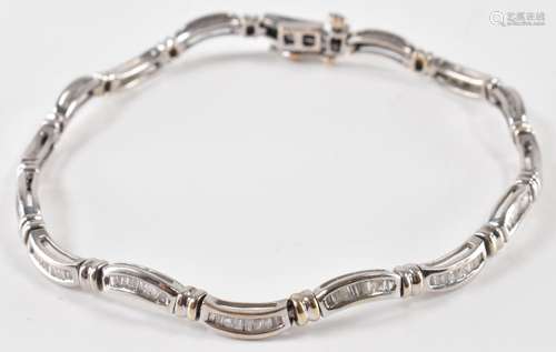 A WHITE GOLD AND DIAMOND TENNIS BRACELET