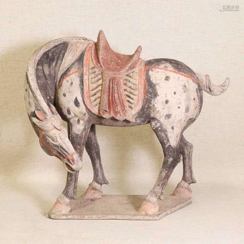 A Chinese painted enamel pottery horse,