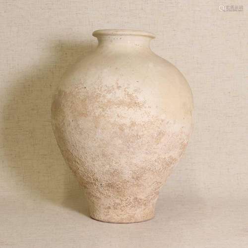 A Chinese white-glazed jar,