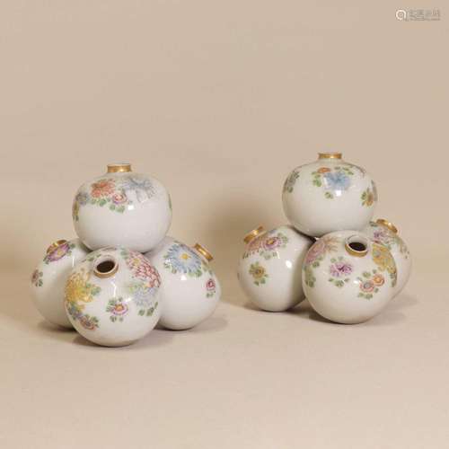 A pair of Japanese famille rose spill vases,