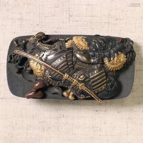 A Japanese mixed-metal, gold and silver inlaid buckle,