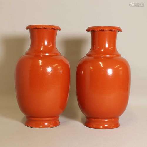 A pair of Chinese coral-red glazed vases,