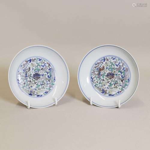 A pair of Chinese doucai saucers,