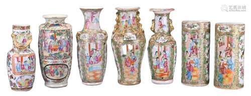 A GROUP OF SEVEN CHINESE CANTON FAMILLE ROSE PORCELAIN VASES...