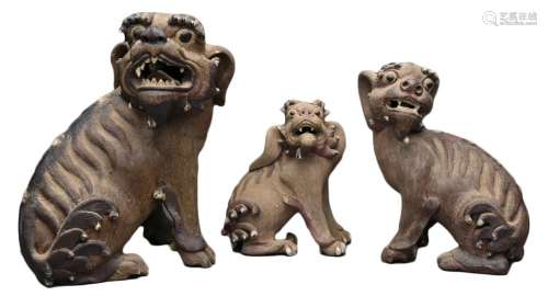THREE CHINESE SHIWAN POTTERY LION DOGS, LATE QING DYNASTY