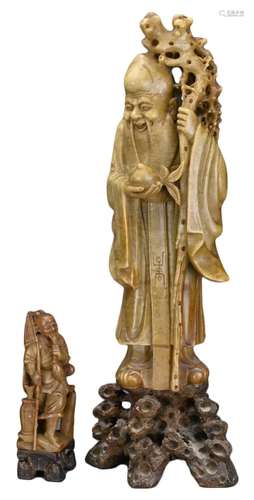 TWO CHINESE CARVED SOAPSTONE FIGURES, EARLY 20TH CENTURY