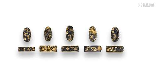 FIVE FUCHI-GASHIRA (HILT COLLARS AND POMMELS) IN MINO GOTO S...