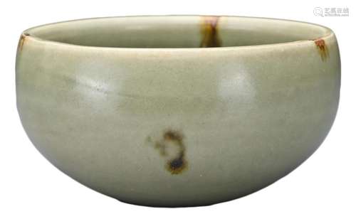 A CHINESE LONGQUAN CELADON AND IRON-SPOT POTTERY TEA BOWL