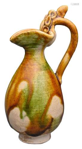 A CHINESE SANCAI GLAZED MINIATURE EWER