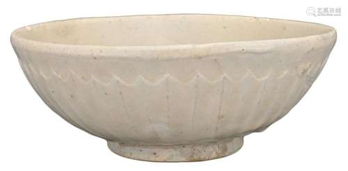 A CHINESE CIZHOU WHITE-GLAZED POTTERY CHRYSANTHEMUM BOWL, SO...