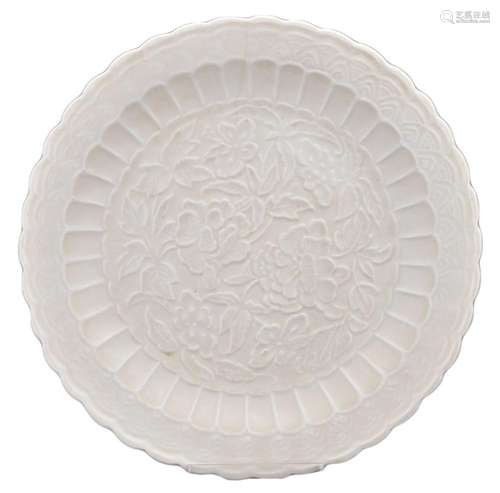 A CHINESE DING-TYPE 'CHRYSANTHEMUM-HEAD' MOULDED DISH