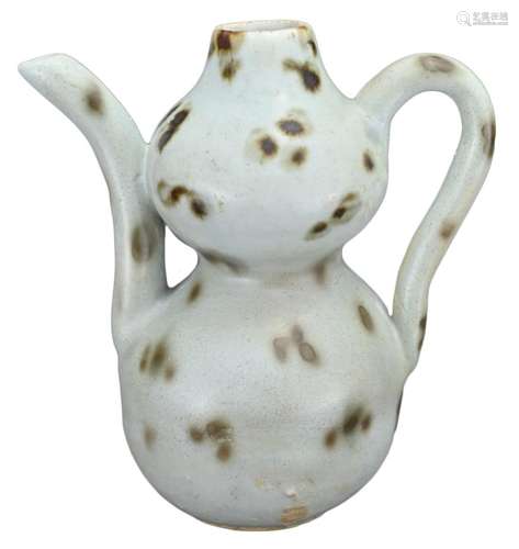 A CHINESE QINGBAI TOBI-SEIJI GLAZED POTTERY EWER, YUAN DYNAS...