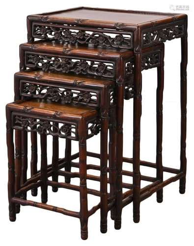 A NEST OF FOUR CHINESE ROSEWOOD OCCASIONAL TABLES, 19TH CENT...