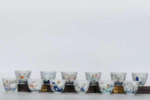 A Group of Twelve Porcelain Cups