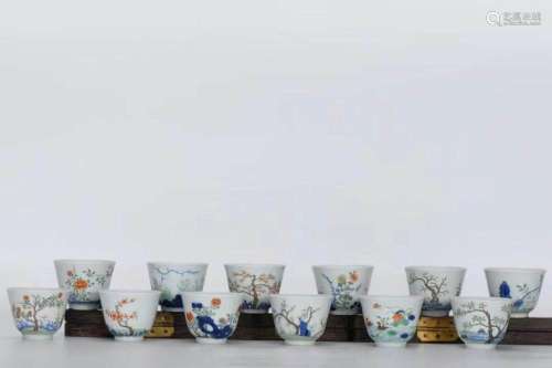 A Group of Twelve Porcelain Cups