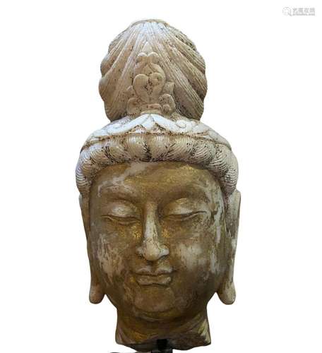 A Carved Stone Buddha Head