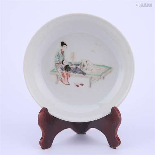 A multicolored figure porcelain plate