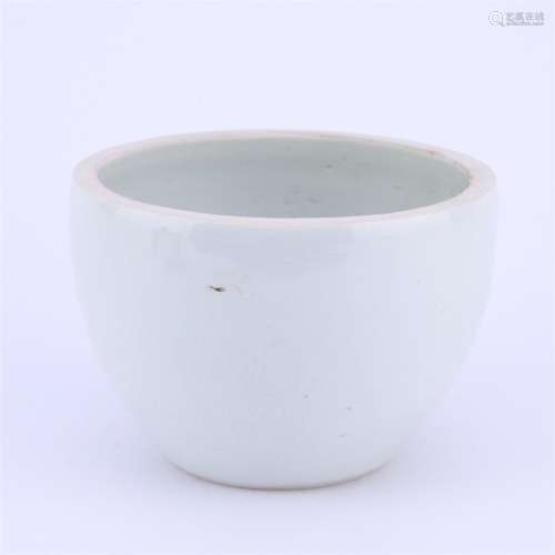 A white glazed figure carved porcelain vat