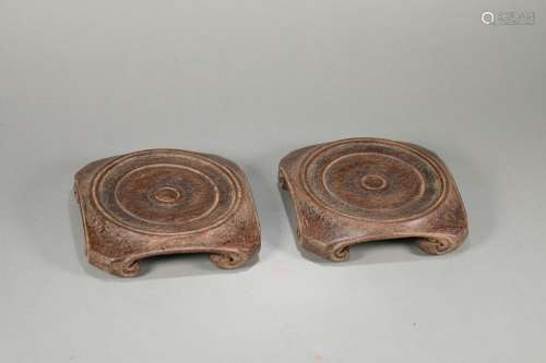 A pair of red sandalwood pedestals