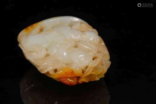 A Hetian jade hollowed out stove top ornament