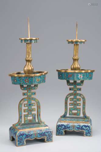 A pair of inscribed cloisonne candlesticks