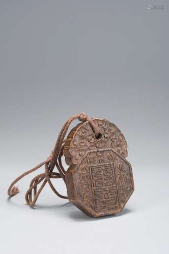 A carved aloeswood pendant