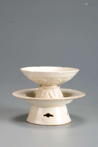 A flower carved Ding kiln porcelain cup