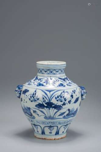A blue and white porcelain vase with beast shaped ears