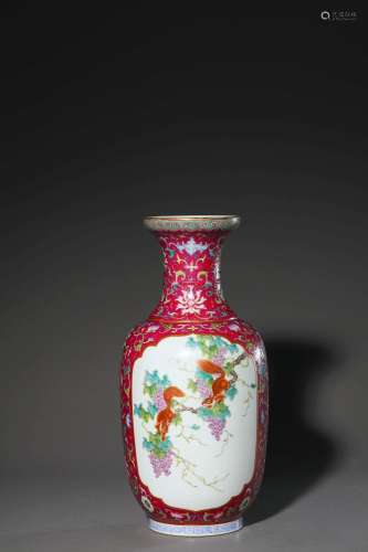 A famille rose squirrel and grape porcelain vase