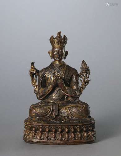 A Tibetan copper buddha statue