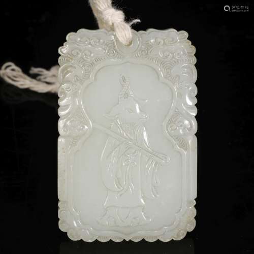 A carved Hetian jade pendant