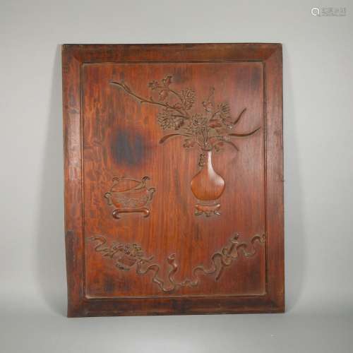 A carved fragrant rosewood plaque