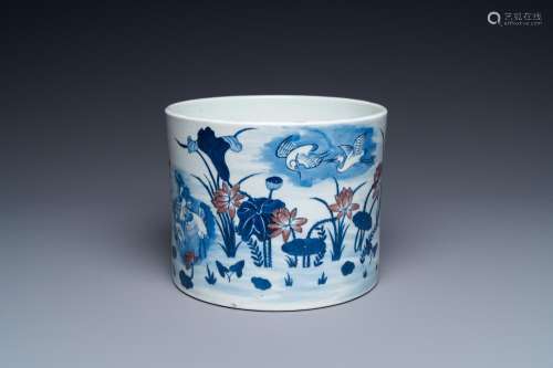 A large Chinese blue, white and copper-red brush pot, 19th C...