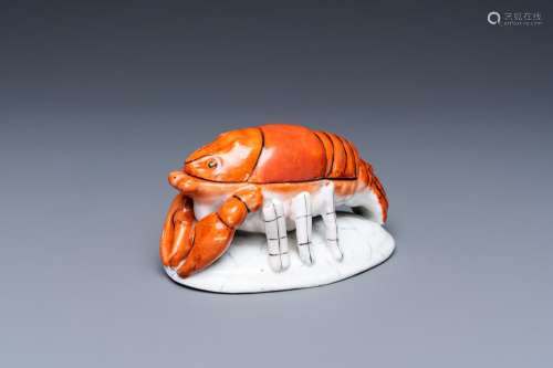 A Chinese polychrome box and cover in the shape of a lobster...
